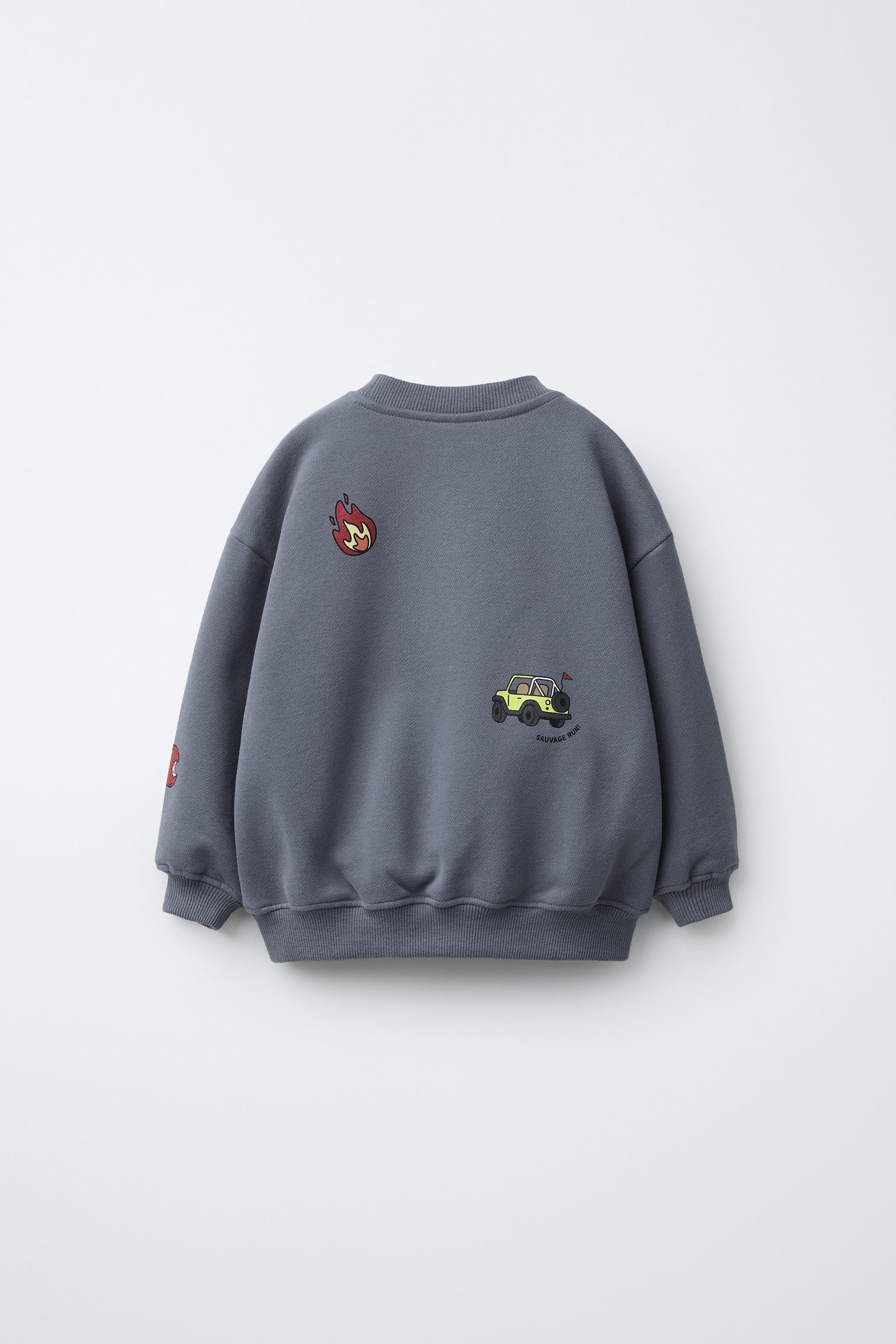 ANIMAL PRINT SWEATSHIRT